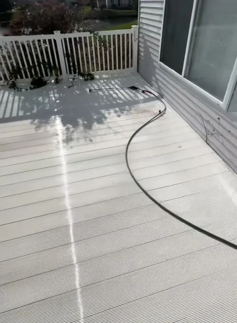 The same vinyl deck clean after our wash